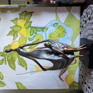 Woman with child statue